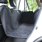 Waterproof pet seat cover installed on a car back seat
